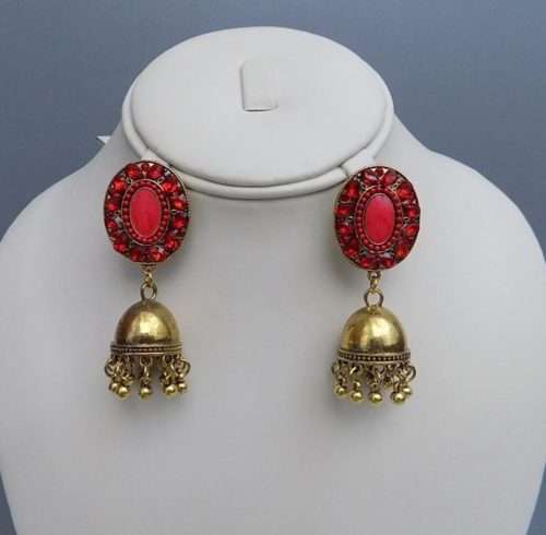 Red Oval Shaped with Golden Bells Earrings 3 Red oval shaped with golden bells hanging Earrings for Ladies. <a href="https://subrung.online/product-category/fashion/jewelry/for-ladies/" target="_blank" rel="noopener noreferrer">(More Ladies Jewelry)</a>