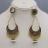 Traditional Styled Earrings In Golden Colour