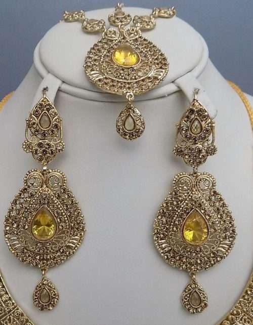 Heavy Golden Set With Champagne Crystals and Mathapati 1 Heavy Golden Set with Champagne Crystals and Mathapati for Ladies. <a href="https://subrung.online/product-category/fashion/jewelry/for-ladies/" target="_blank" rel="noopener noreferrer">(More Ladies Jewelry)</a>