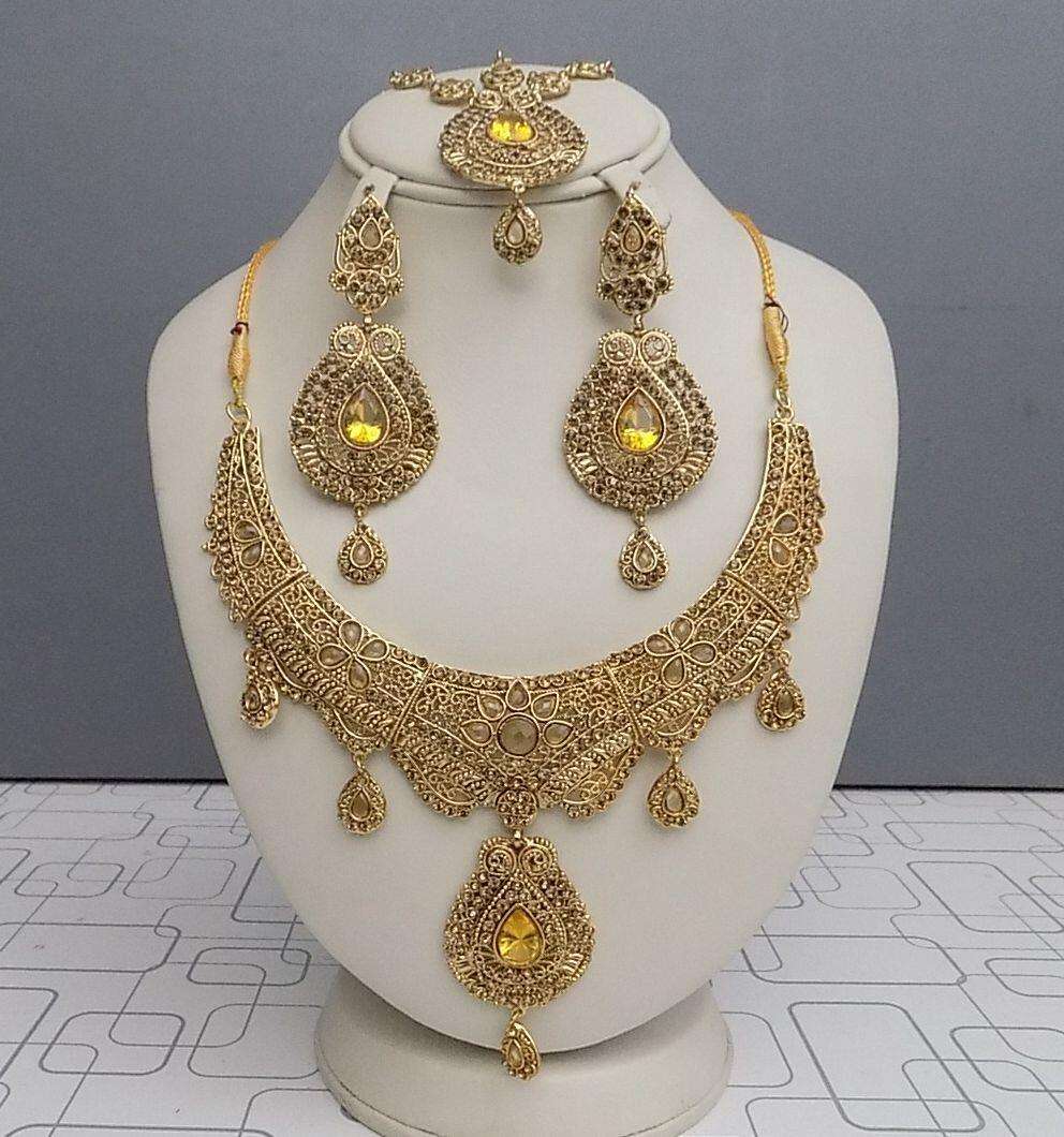 Heavy Golden Set With Champagne Crystals and Mathapati