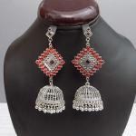 Stylish Silver and Golden Jhumkay With Red and Pink Crystals